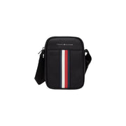 Black Tommy Hilfiger metro mini reporter crossbody bag with vertical red white and navy stripe front design
