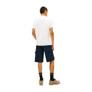 Dark blue denim cargo shorts with reinforced stitching and side pockets paired with tommy hilfiger men organic cotton white t shirt