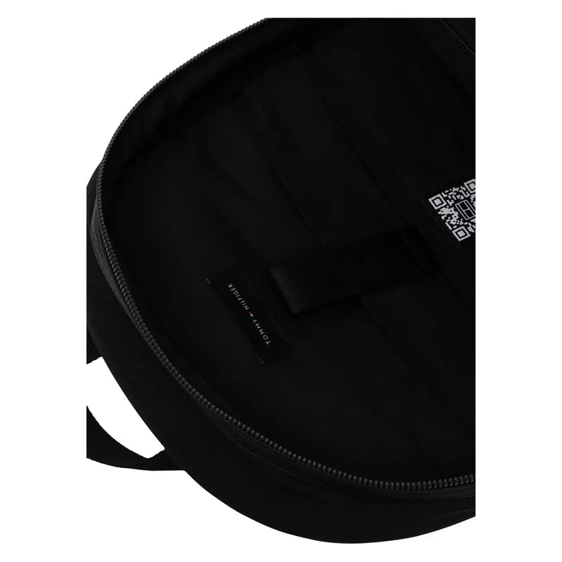 Black Tommy Hilfiger men Repreve backpack with sleek minimalist design and subtle branding featuring zip pockets 15 cm wide