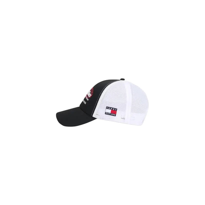 Black and white mesh Tommy Hilfiger men script trucker cap with red white and blue logo patch on organic cotton