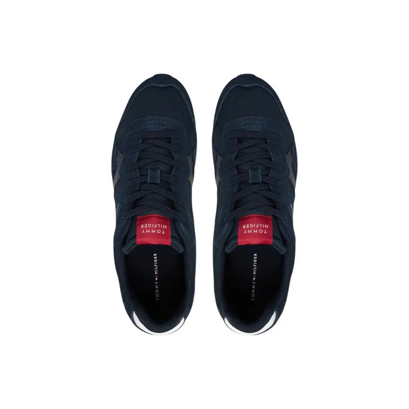Dark navy Tommy Hilfiger men sneakers in polyester with red branding accents and white rubber soles