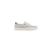 Light gray suede loafers with white rubber sole and navy blue heel tab from Tommy Hilfiger men spring summer shoes