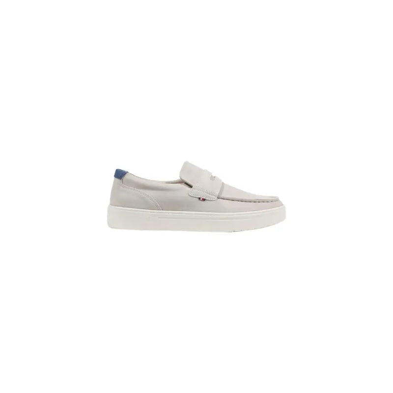 Light gray suede loafers with white rubber sole and navy blue heel tab from Tommy Hilfiger men spring summer shoes
