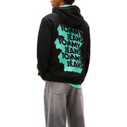 Au dos du sweat-shirt à capuche Tommy Hilfiger pour homme, en coton biologique noir, avec logo Tommy Jeans superposé turquoise et noir.