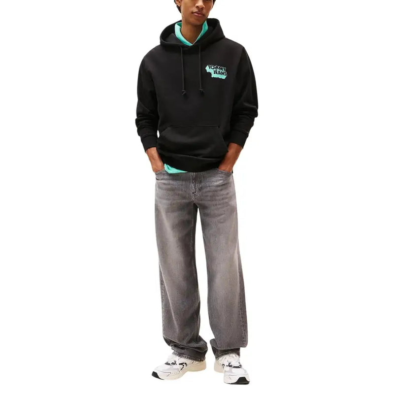Tommy Hilfiger Sweat-shirt à capuche noir en coton biologique pour homme, doublure intérieure turquoise et logo assorti sur la poitrine.