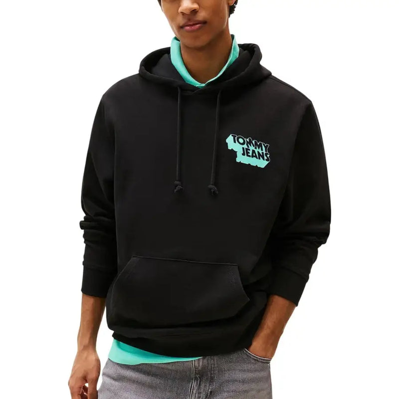 Tommy Hilfiger Sweat-shirt à capuche noir en coton biologique pour homme, doublure intérieure turquoise et logo assorti sur la poitrine.