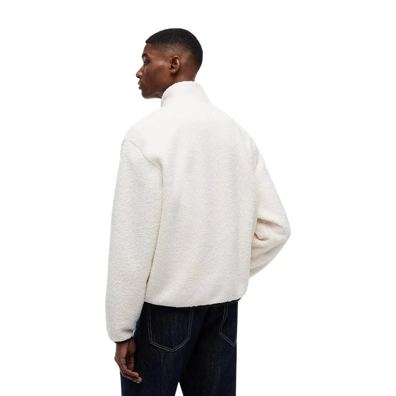 Cream-colored fleece jacket with high collar and long sleeves as part of tommy hilfiger men sweatshirt white hooded polyester collection