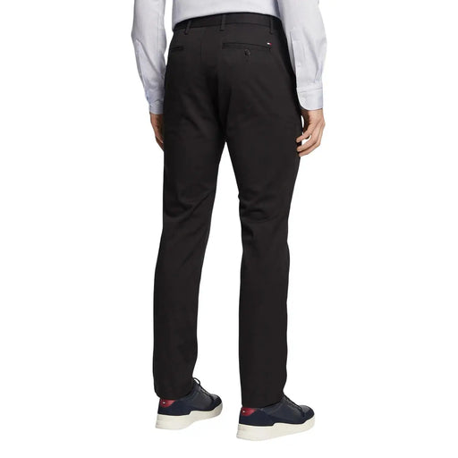 Tommy Hilfiger men trousers in black tailored fabric with sleek straight-leg cut and subtle stitching details