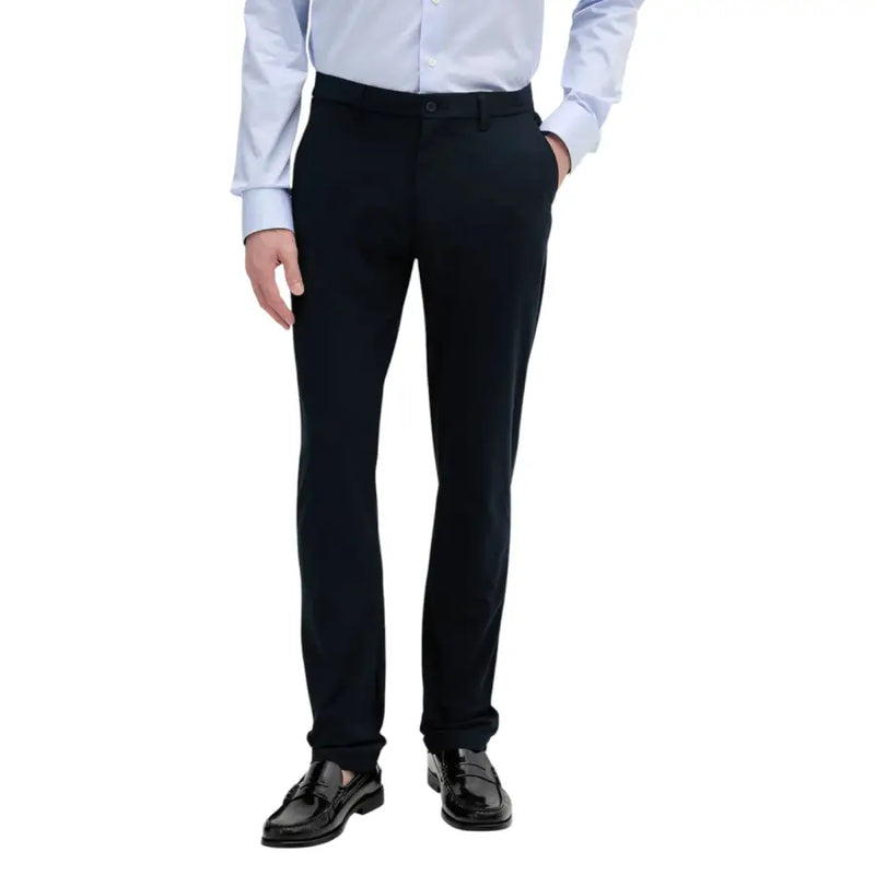Schwarzer, maßgeschneiderter Tommy Hilfiger Herrenhose mit elegantem, geradem Bein und dezenter Bügelfalte am Bund