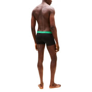Tommy Hilfiger Schwarze Herren-Boxershorts mit leuchtend grünem Gummibund und Markenlogo
