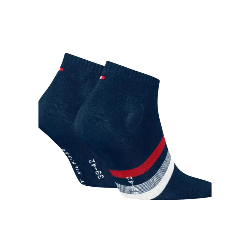 Dark blue tommy hilfiger men ankle socks with red and white striped band and logo on the heel back side view