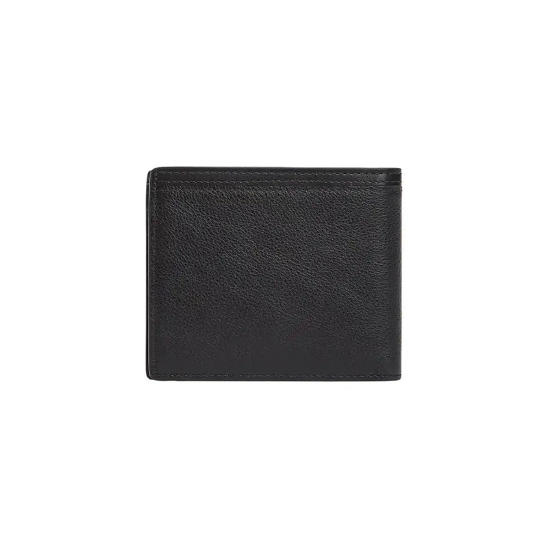 Tommy Hilfiger Herrengeldbörse aus schwarzem, strukturiertem Leder mit präzisen Ziernähten an den Kanten