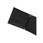 Tommy Hilfiger men wallet in black leather with red white and blue striped stitching along the edges