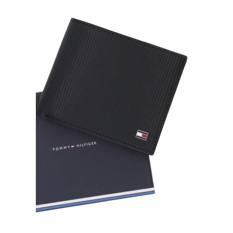 Tommy Hilfiger men wallet black textured leather with subtle striped pattern and logo on lower right corner