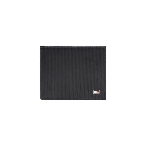 Black textured tommy hilfiger men wallet featuring a small rectangular logo on the lower right corner visible side