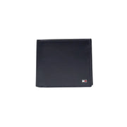 Black leather wallet for men with small tommy hilfiger flag logo on lower right corner by Tommy Hilfiger