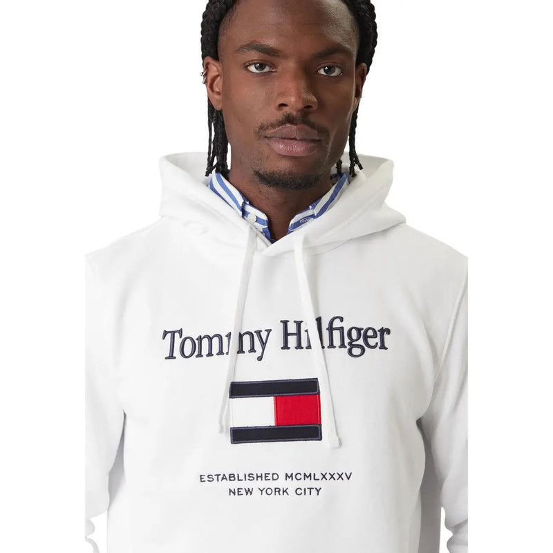 Tommy Hilfiger men white cotton sweatshirt with bold black logo and iconic red white navy flag patch