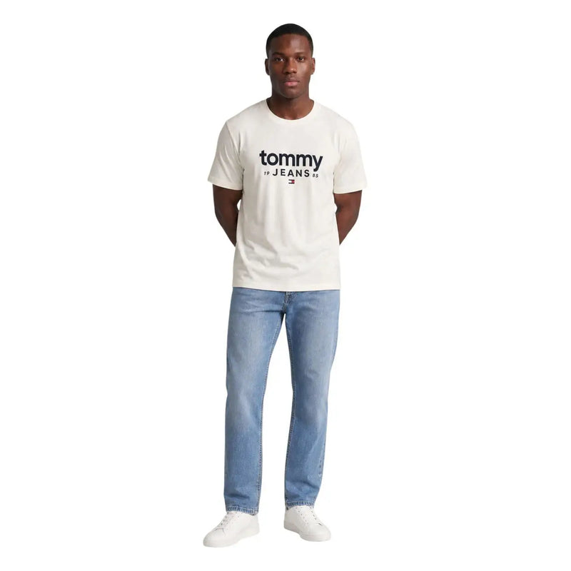 Cream-colored Tommy Hilfiger men white cotton T shirt with black logo and red, white, and blue flag emblem organic