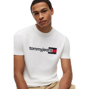 White tommy hilfiger men cotton t shirt featuring a black and red logo on the chest made from organic cotton