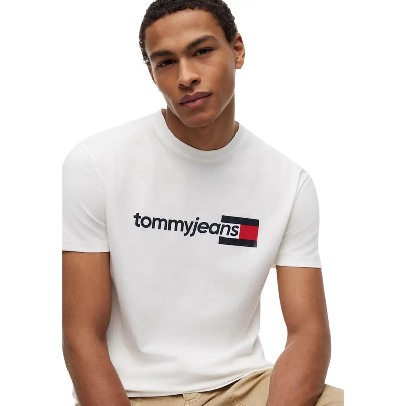 White tommy hilfiger men cotton t shirt featuring a black and red logo on the chest made from organic cotton