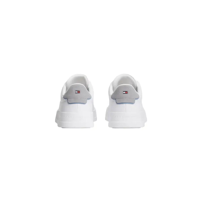 White tommy hilfiger men leather sneakers with laces and gray heel tab featuring the brand flag logo visible from the back