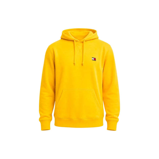 Bright yellow tommy hilfiger men hoodie made from organic cotton with a small logo patch on the left chest