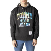 Tommy Hilfiger men’s black organic cotton hoodie with faded tie-dye tommy 1985 jeans graphic and white drawstrings