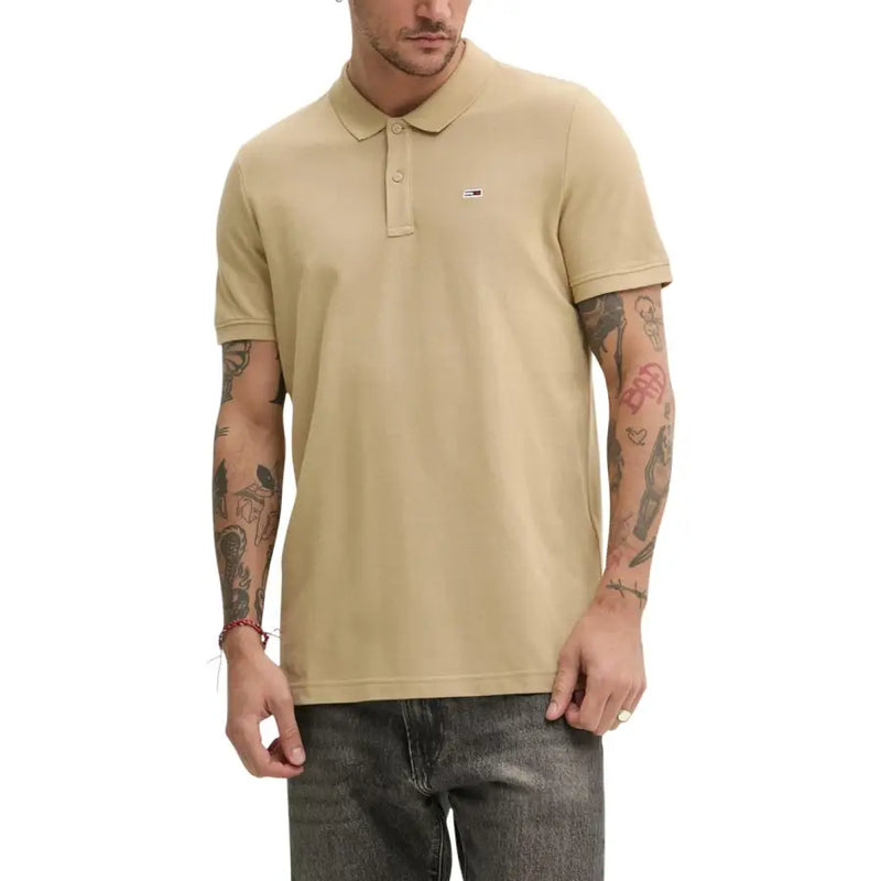 Beige Tommy Hilfiger men’s polo shirt with classic collar and logo on chest for summer wear