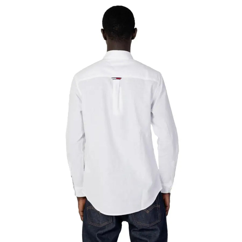 Tommy Hilfiger men’s white long sleeve button-down shirt showing the back with a subtle collar logo