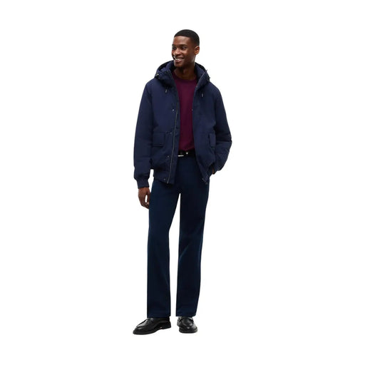 Tommy Hilfiger puffer jacket for men in navy blue with hood and front zipper, front view