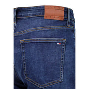 Tommy Hilfiger slim fit jeans for men in dark blue denim with brown leather logo patch and flag on back pocket back view