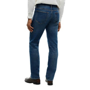 Tommy Hilfiger slim fit jeans for men in dark blue denim with classic straight-leg cut and visible stitching, front view