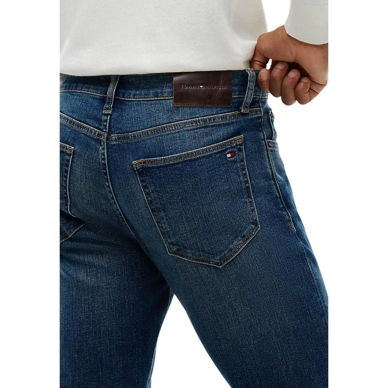 Tommy Hilfiger slim fit jeans for men in dark blue denim with five-pocket design and logo embroidery back view