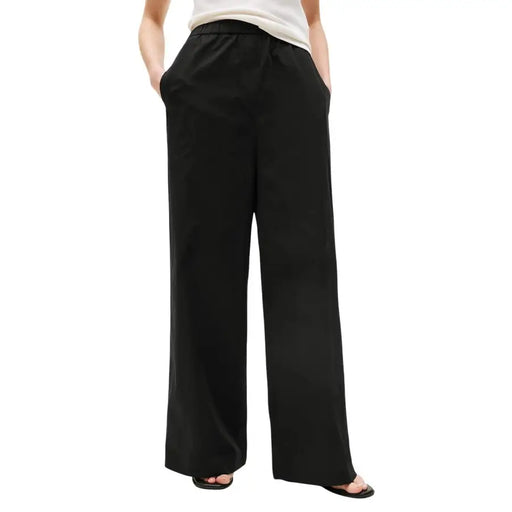 Tommy Hilfiger women black organic cotton wide-leg trousers with relaxed flowing silhouette and elastic waistband