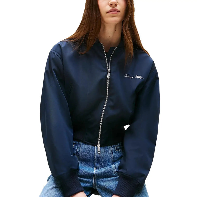 Navy blue tommy hilfiger women polyester bomber jacket with silver zipper and embroidered logo on the left chest