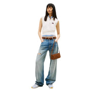 Brown suede crossbody bag with minimalist design and subtle logo detail featured with tommy hilfiger women denim jeans light blue organic cotton