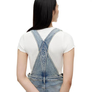 Tommy hilfiger women denim skirt organic cotton blue shown with light-wash denim overalls back cross-back design