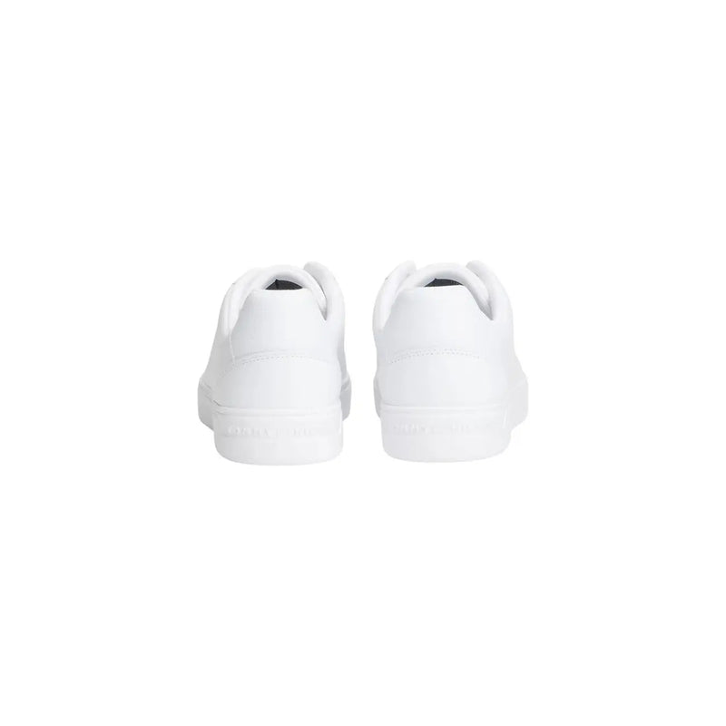 White leather sneakers with a clean minimalist design and subtle branding on the heel by Tommy Hilfiger women