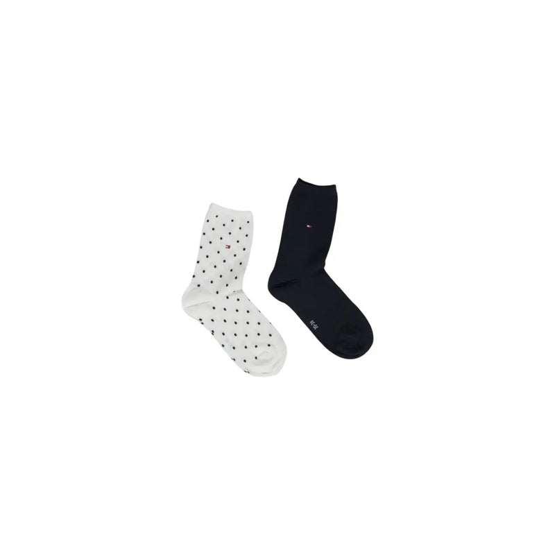 A pair of tommy hilfiger women socks with one white black polka dot and one navy blue cotton blend size s