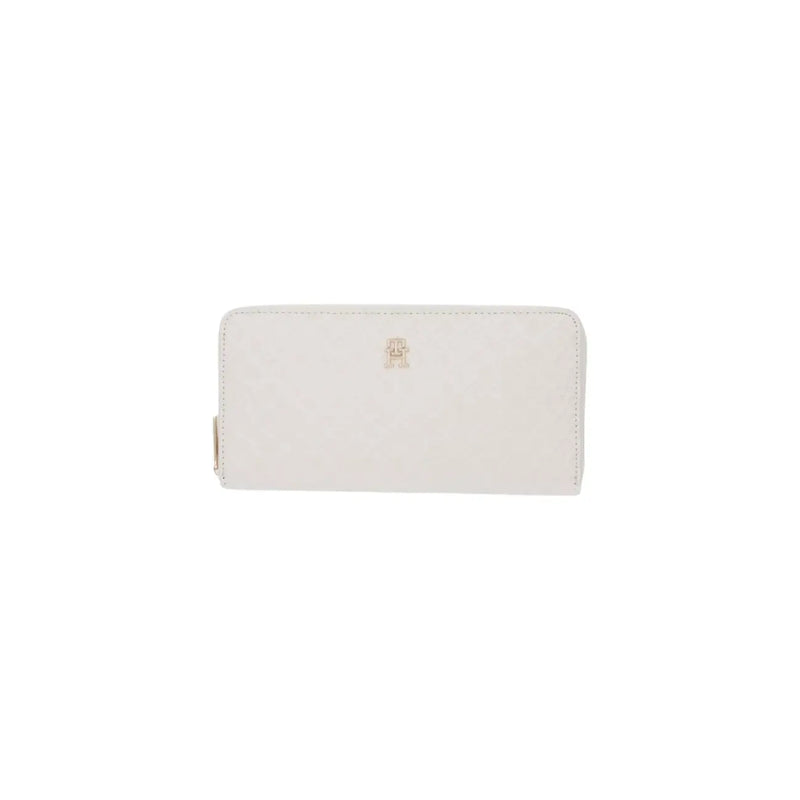 White leather Tommy Hilfiger women wallet with zip and subtle gold-tone logo emblem on the front in polyurethane
