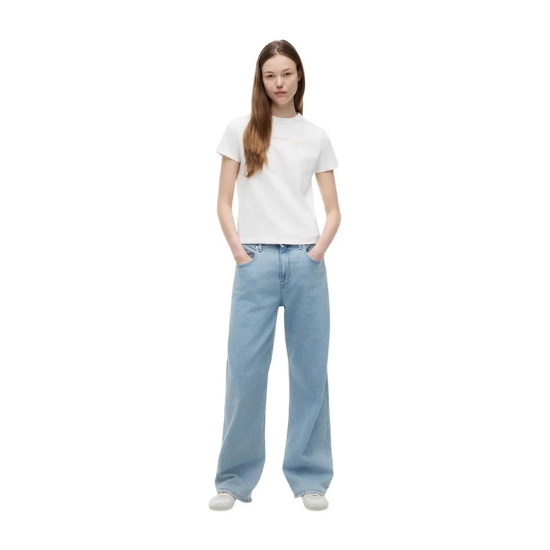 Light blue wide-leg denim jeans paired with tommy hilfiger women white organic cotton short t shirt front view