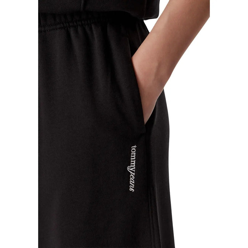 Black cotton tommy hilfiger women wide leg sweatpants with ribbed texture and subtle white embroidered branding on side seam