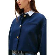 Tommy Hilfiger women’s navy blue cropped jacket with white collar and gold-tone buttons in long sleeve blazer style