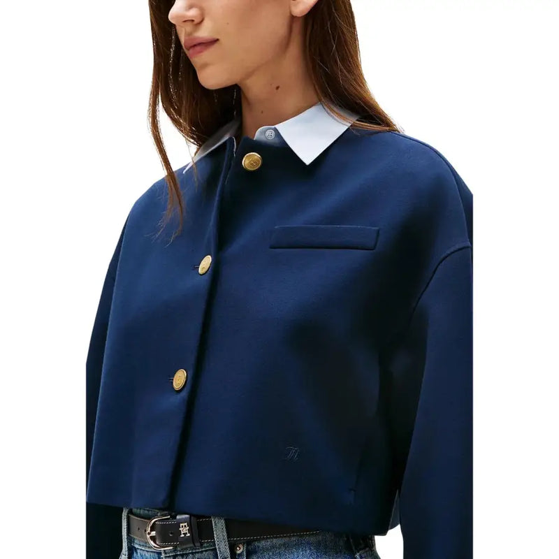 Tommy Hilfiger women’s navy blue cropped jacket with white collar and gold-tone buttons in long sleeve blazer style