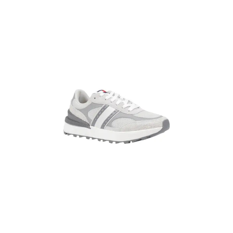 Tommy Hilfiger women’s grey leather sneakers with mesh upper, striped side panel, and chunky sole