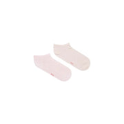 A pair of tommy hilfiger women’s pink cotton ankle socks with soft texture and small red branding on the side
