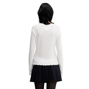 Tommy Hilfiger Damen-Langarmpullover aus weißer Bio-Baumwolle top mit gewelltem Saum