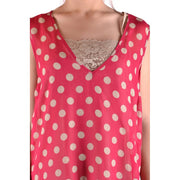 A vibrant pink sleeveless polyester tank top by Simona Barbieri with white polka dots and lace trim at the v-neckline