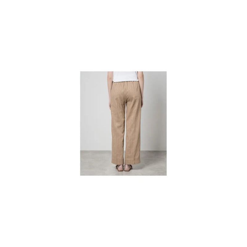 Beige linen trousers with subtle vertical stripes and elastic waistband from Twinset women cotton linen collection