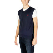 Navy blue polo sweater vest with white sleeves and red logo, u.s.